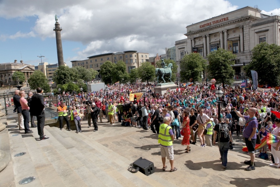 The Lord Mayor of Liverpool Gary Millar talking to the crowds gathered at St.Georges Hall for the start of The 2013 Liverpool Pride, photograph by David Munn