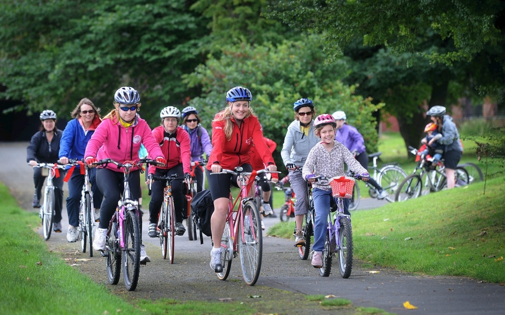 National Cycling Centre / Philips Park , Stuart Street , Manchester . Breeze Women and childrens bike ride to celebrate the success of women in the olympics especially women cyclists . The cyclists in Philips park . 23 September . 2012 . Picture by Matt Ratcliffe