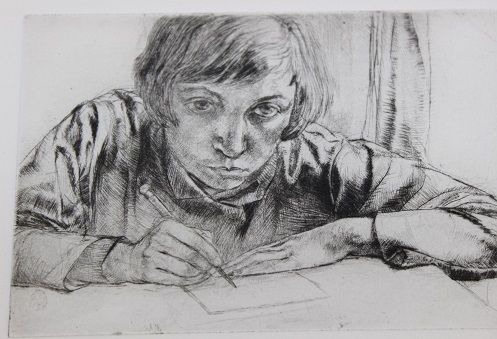 black and white sketch of an artist drawing leaning on a table