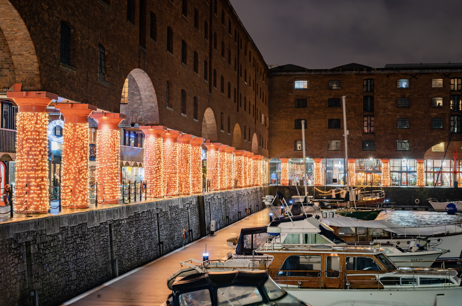 Fairy lights on the inner columns at the royal albert dock all lit up of a night