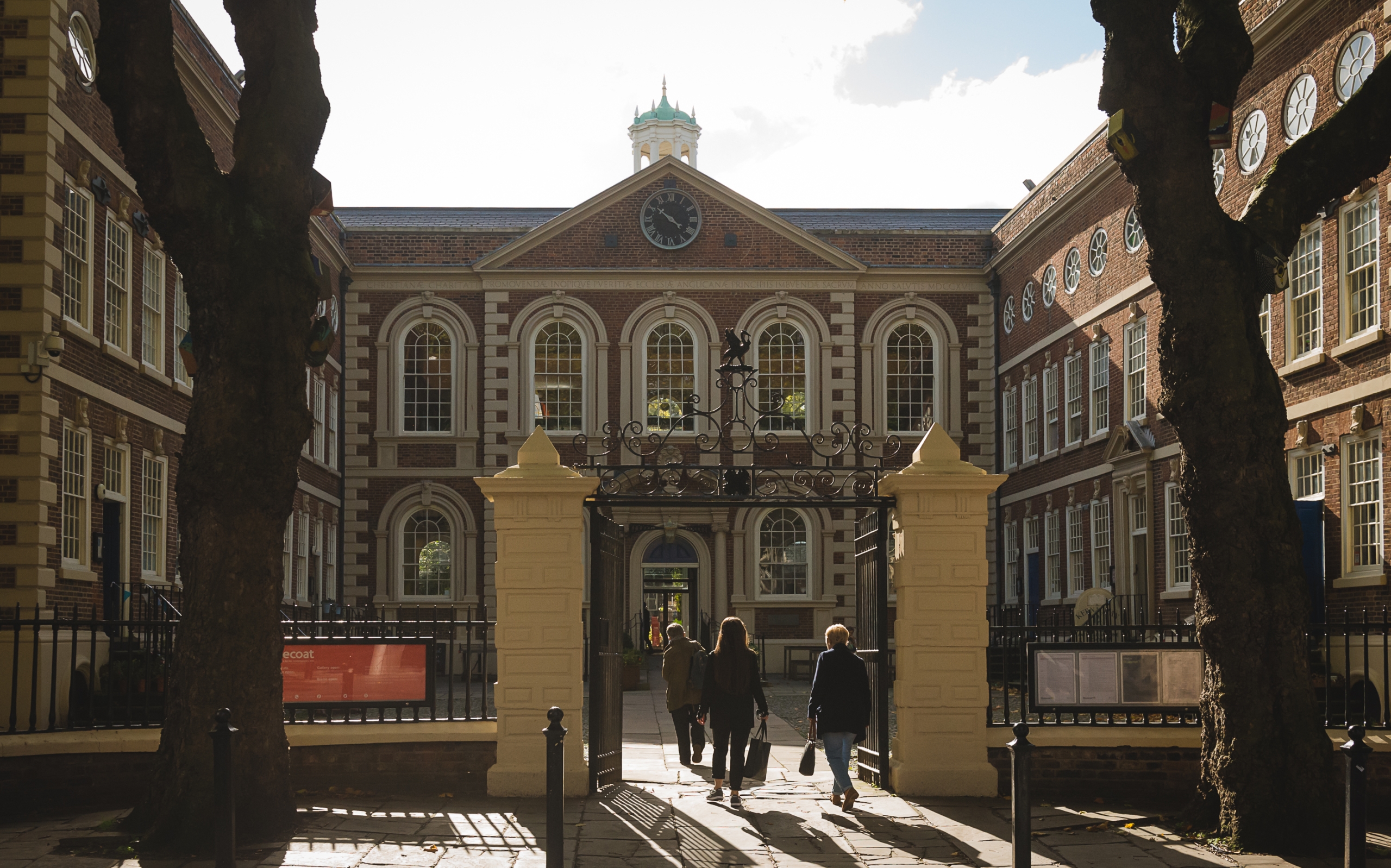 bluecoat from the front through the front gates at daytime