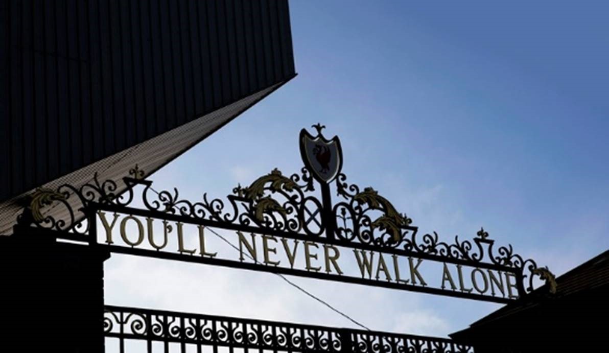 close up of ornate sign on LFC gates saying You'll Never Walk Alone