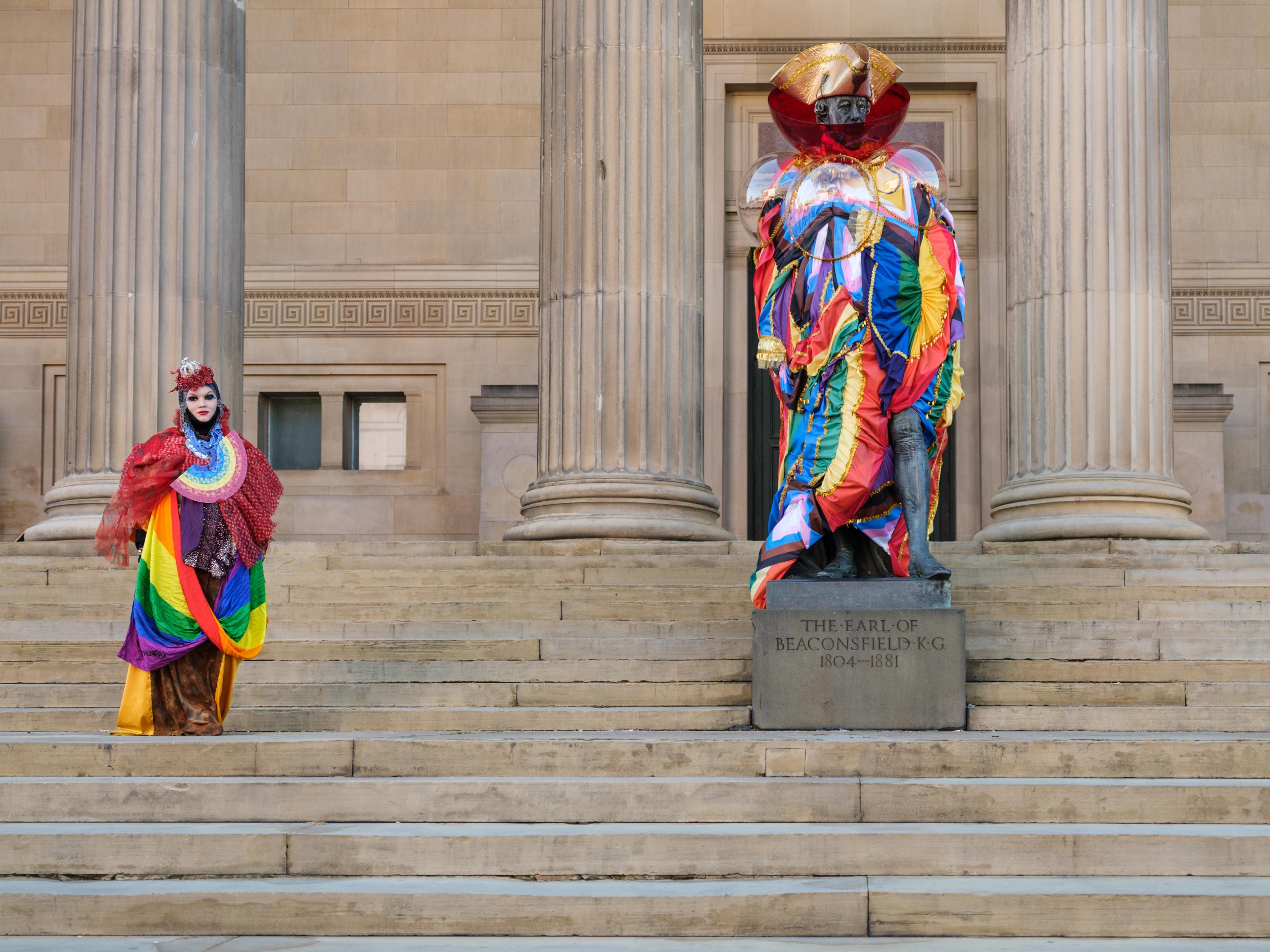 statue outside St georges hall dressed in bright colours