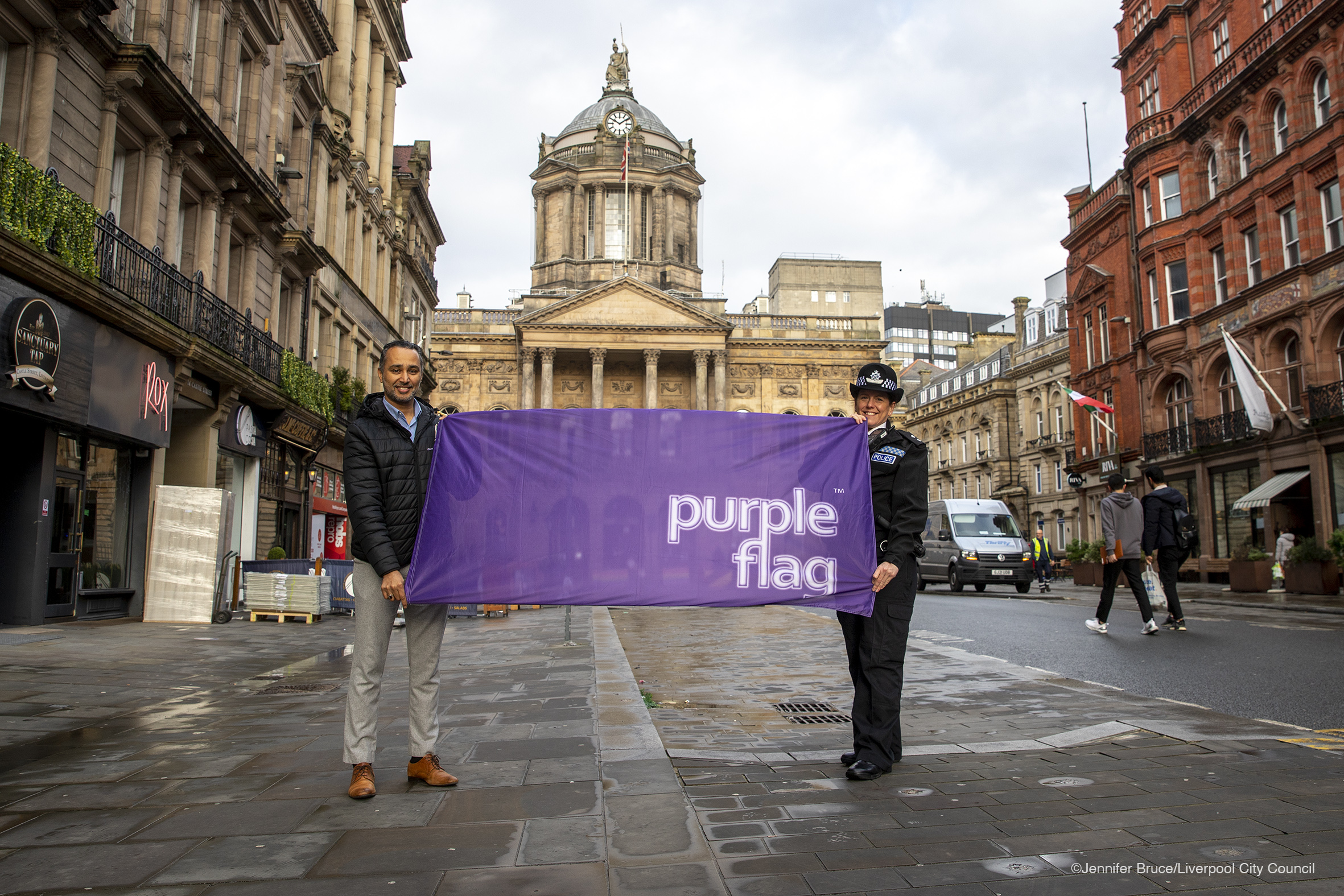 Liverpool City centre award - Cllr Abdul Qadir and city centre inspector Charlotte Irlam mark Liverpool’s Purple Flag status for night time economy