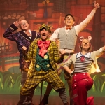 four adults dressed in characters from wind in the willows on stage at the epstein