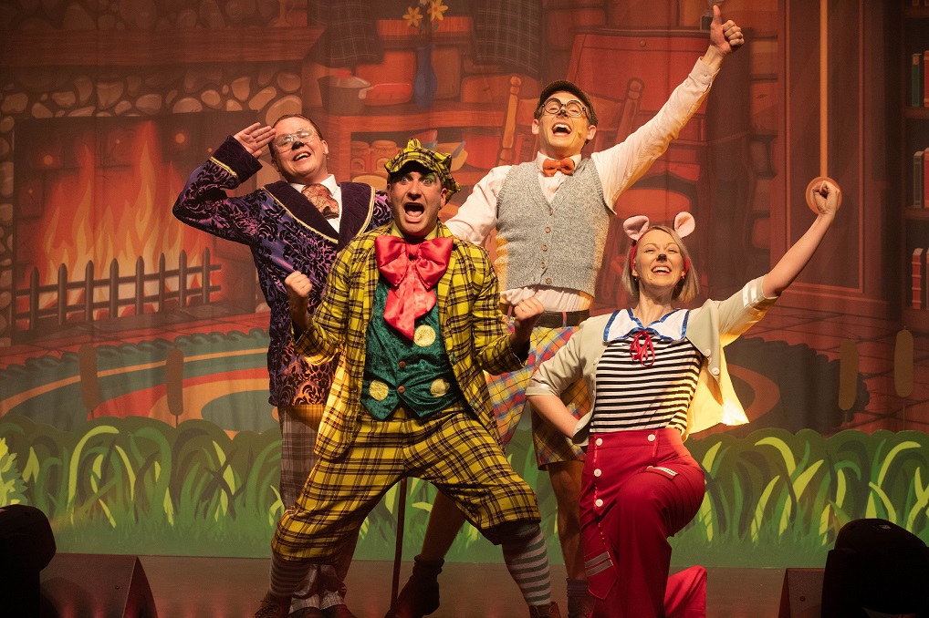 four adults dressed in characters from wind in the willows on stage at the epstein
