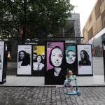 large panels of freestanding images called everyday climate heroes in liverpool one