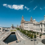 liverpool waterfront on a sunny day view from the museum towards the three graces