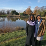 two ladies from nelson mandela family stood in park on a sunny day