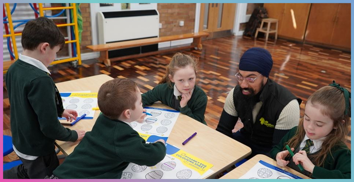 Pupils at St Paul & St Timothy’s Catholic Infant School take part in an egg-painting art workshop with commissioned artist Amrit Singh © Amrit Singh