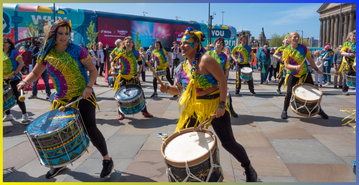 Katumba drumming performing outside of Lime Street Station.