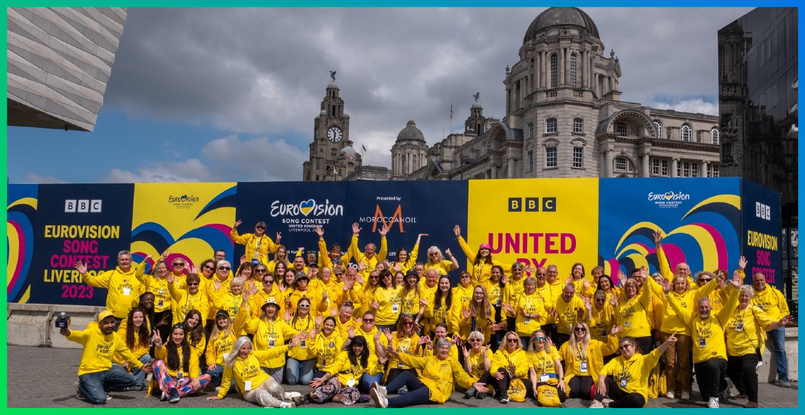 group photo of the Eurovision volunteers on Liverpool Pier Head