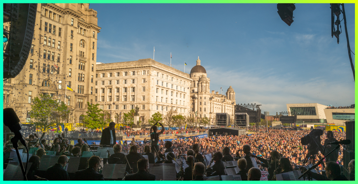 English National Opera performing live on the Eurovision Village Stage in front of large crowds on the Liverpool Pier Head