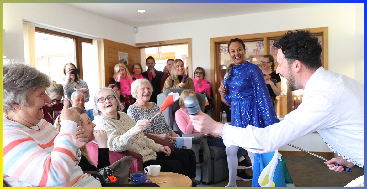 A performance taking place in a care home lounge for all the residents.