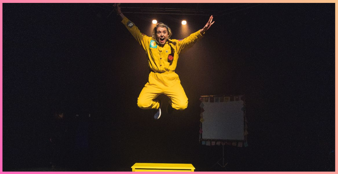 A person wearing all yellow jumping in the air.