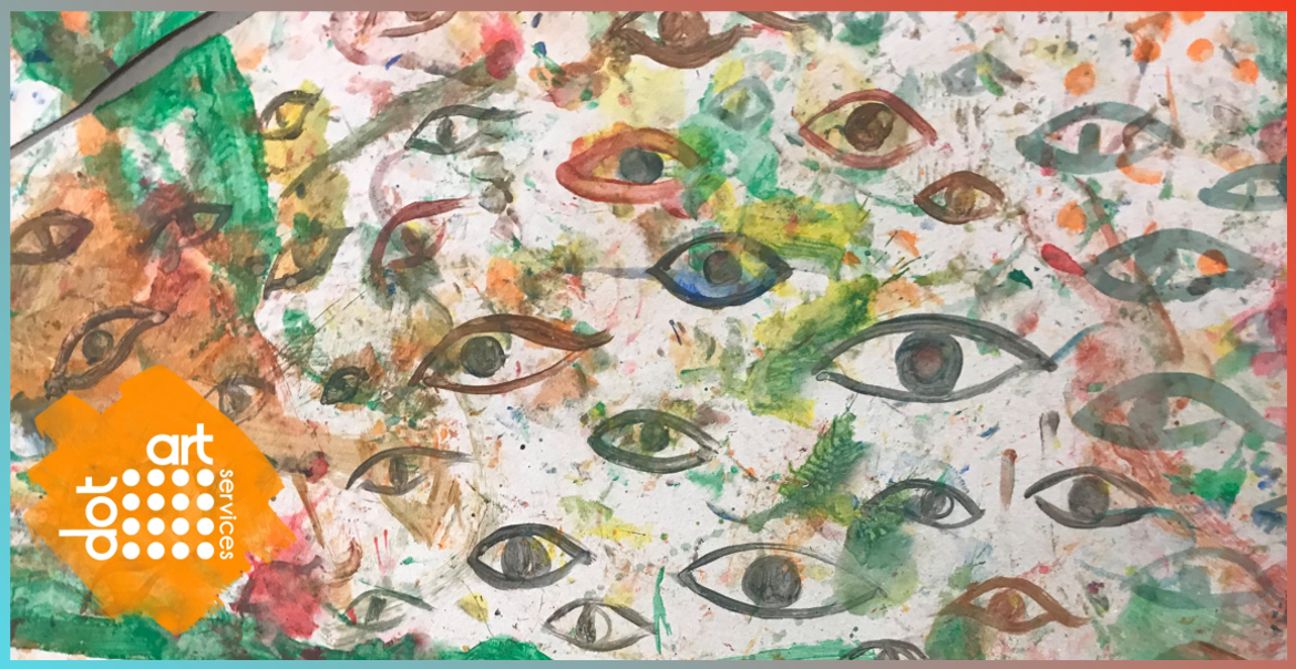 A painted artwork featuring painted eyes.