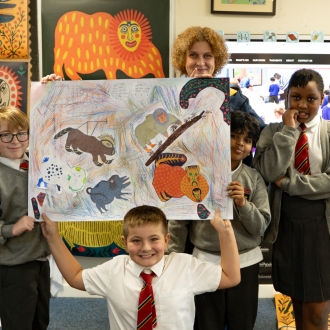 Primary school children and an artist as part of a workshop.