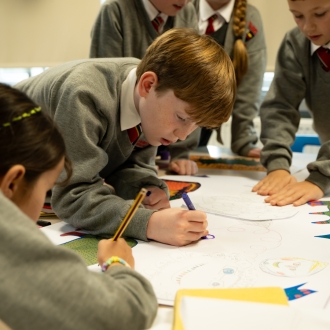 Primary school children and an artist as part of a workshop.