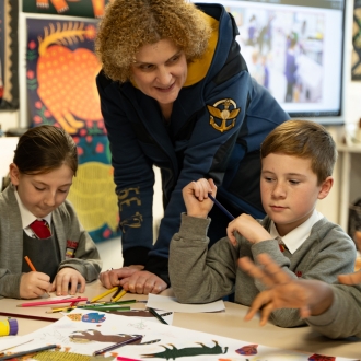 Primary school children and an artist as part of a workshop.