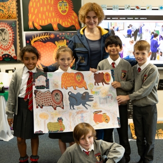 Primary school children and an artist as part of a workshop.