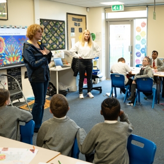 Primary school children and an artist as part of a workshop.