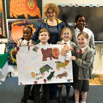 Primary school children and an artist as part of a workshop.