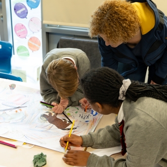 Primary school children and an artist as part of a workshop.