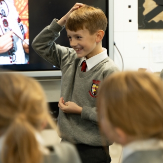 Primary school children and an artist as part of a workshop.