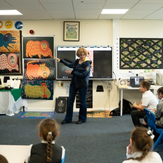 Primary school children and an artist as part of a workshop.