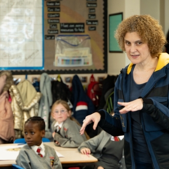 Primary school children and an artist as part of a workshop.