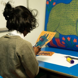 Primary school children and an artist as part of a workshop.