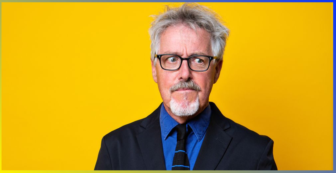 An image of Griff Rhys Jones against a yellow background.