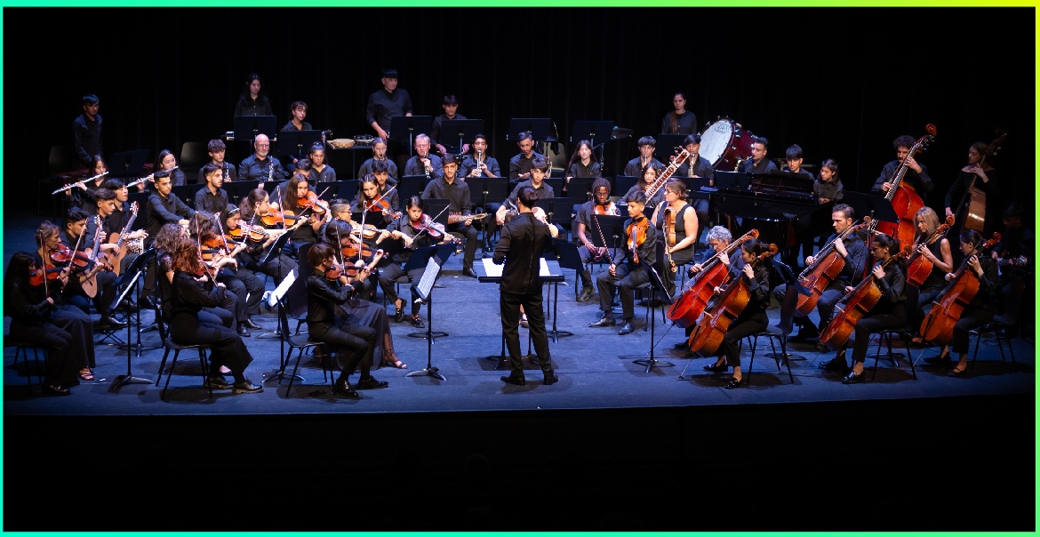 An image of the Afghan Youth Orchestra performing on stage.