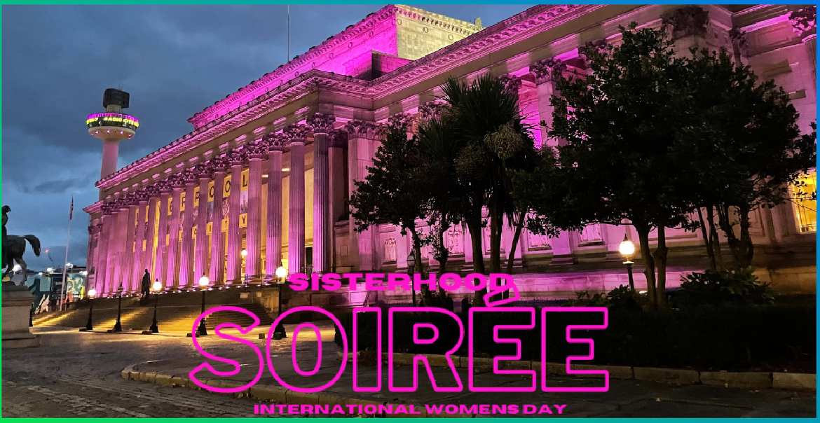 St George's Hall, Liverpool lit up in pink lights. Text reads "SISTERHOOD SOIREE. INTERNATIONAL WOMEN'S DAY."