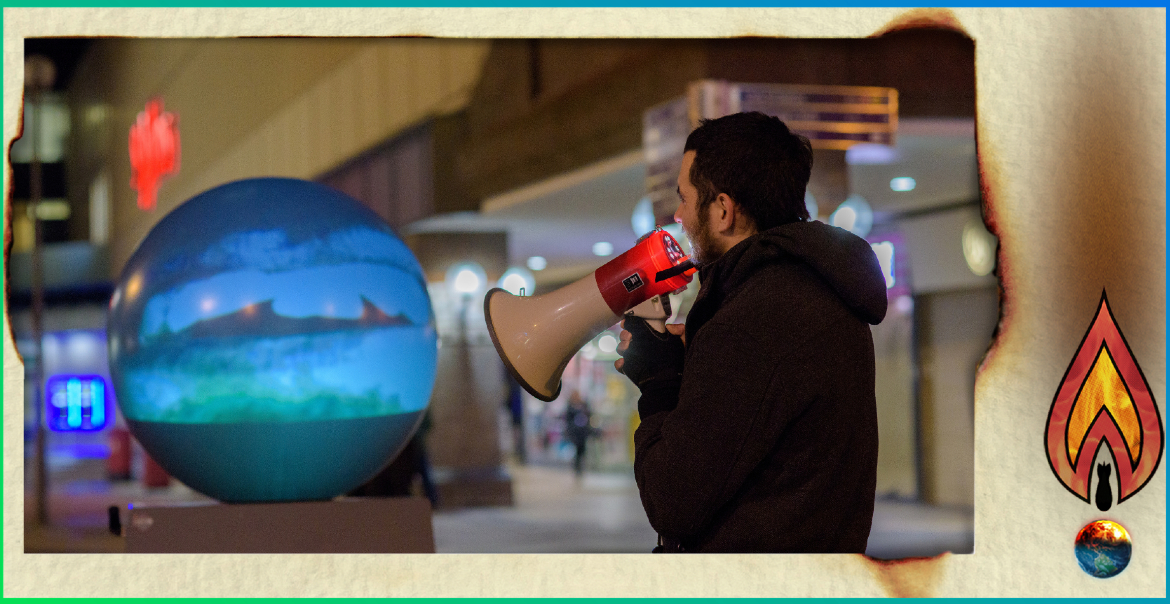 An image of a man shouting down a megaphone with the WoWFest 2024 graphic artwork.
