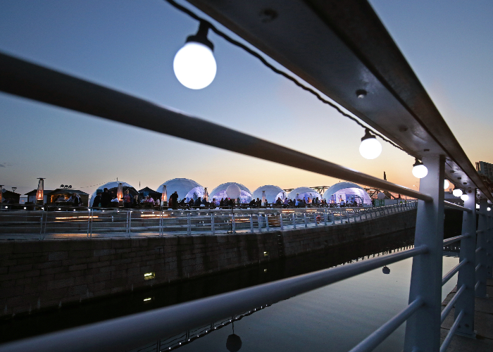 domed structures on the Pier Head in Liverpool at dusk as part of the Bordeaux Wine Festival in 2019