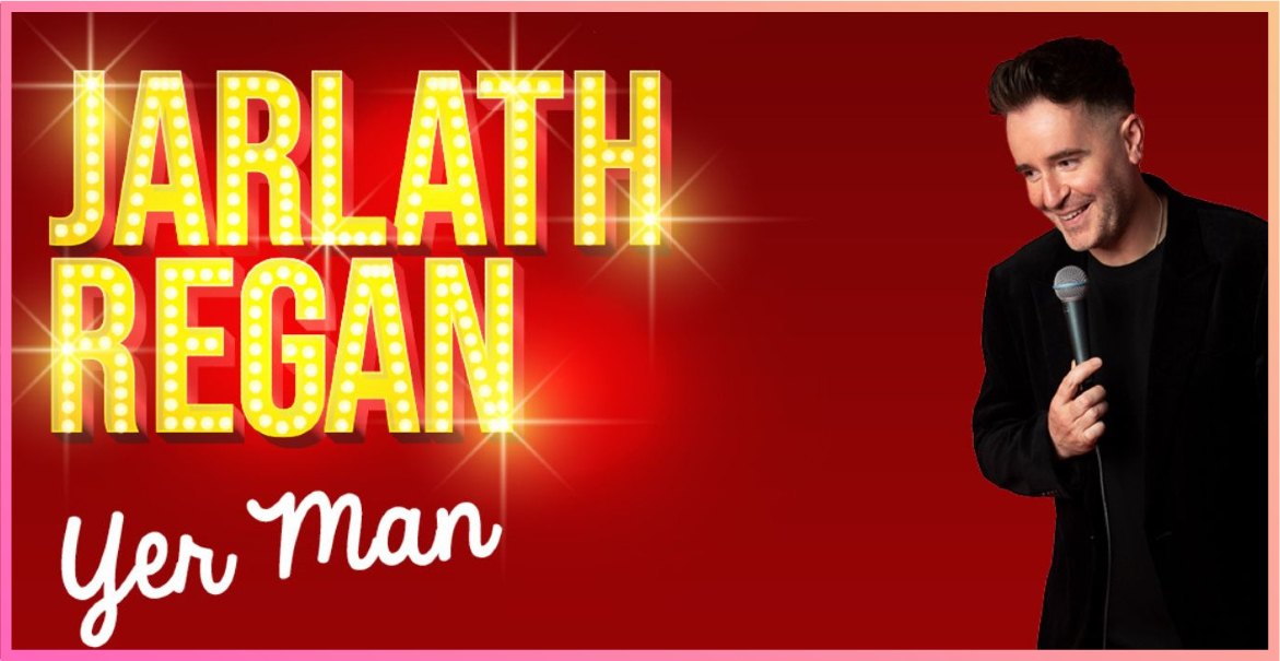 picture of a man holding a microphone stood in front of a red background with the text Jarlath Regan Yes Man