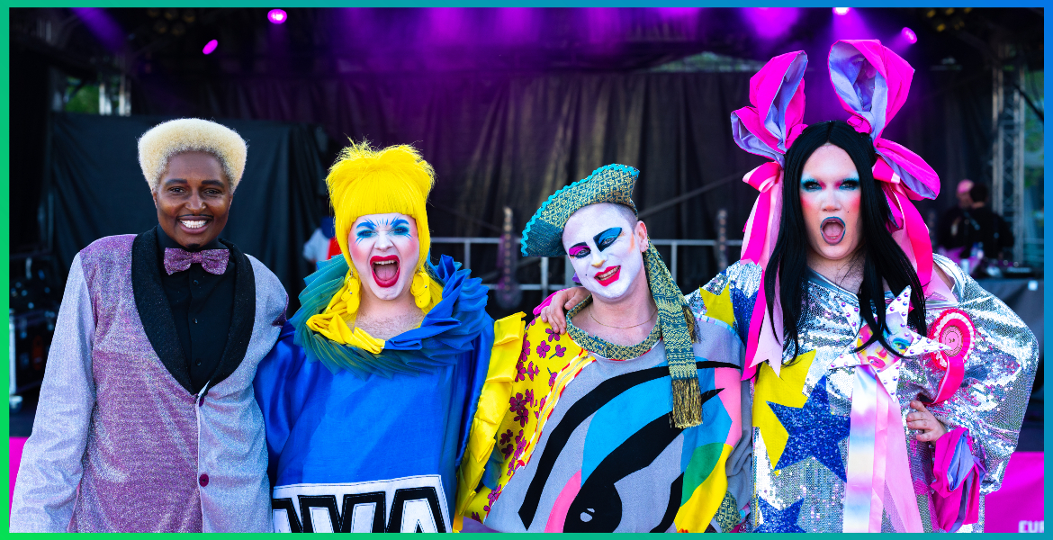 a group of four people dressed in drag as they perform a colourful cabaret