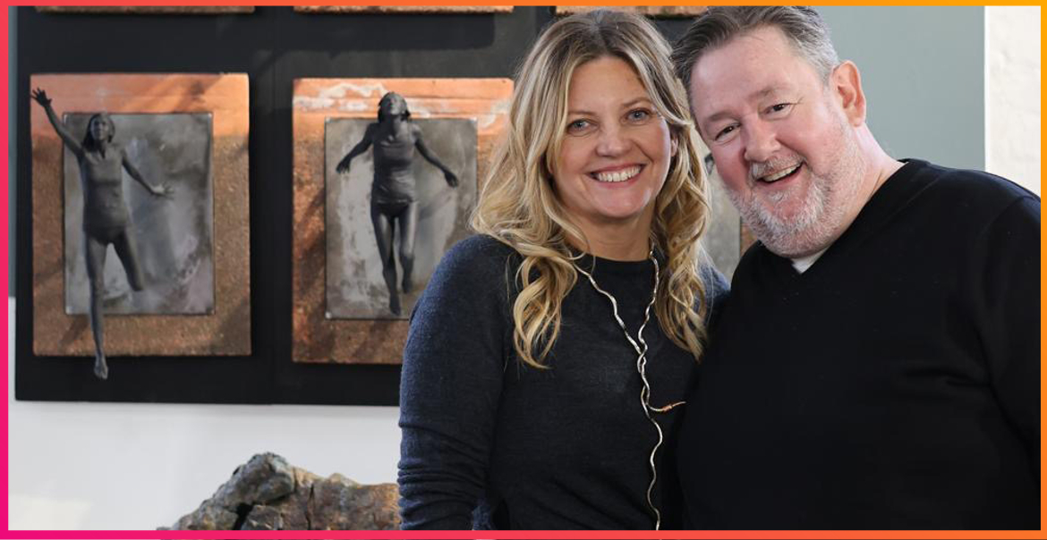An image of Emma Rodgers and Johnny Vegas standing together at an art exhibition.