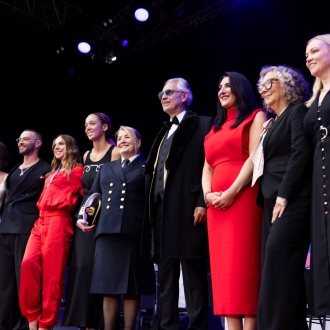 On stage for the naming ceremony of Queen Anne, the line-up stands for a photo including Andrea Bocelli.