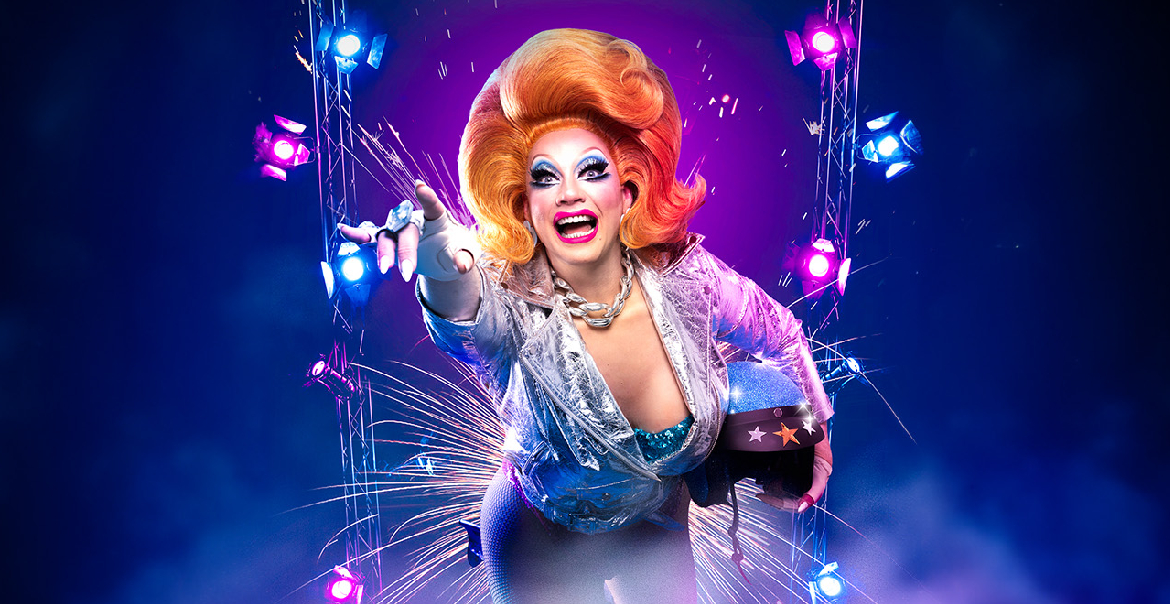 A promotional poster featuring a drag queen with a large ginger wig reaching out with a vibrant purple background.