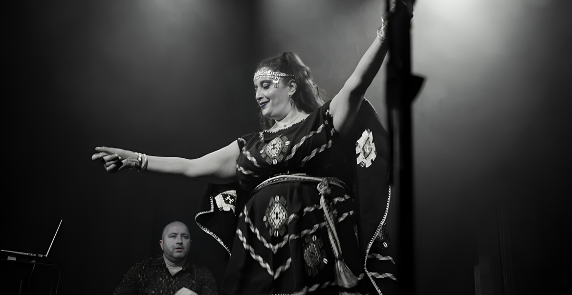 A black and white image of someone dancing.