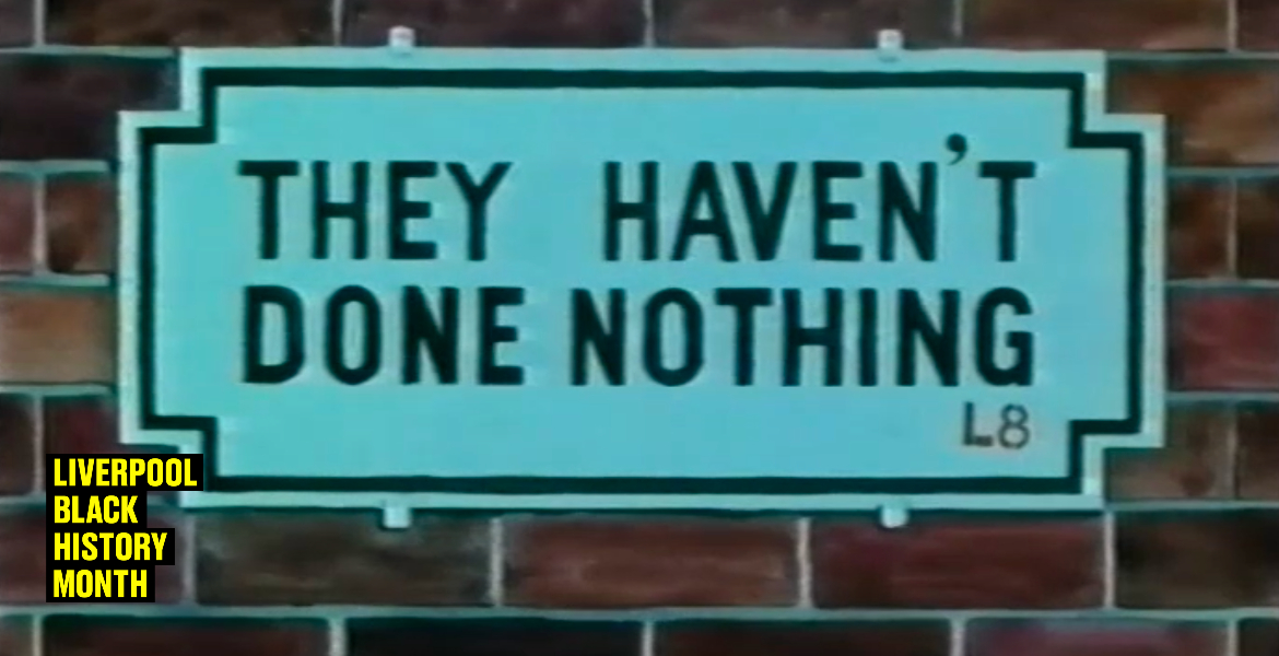 A street sign on a brickwall reading "THEY HAVEN'T DONE NOTHING."